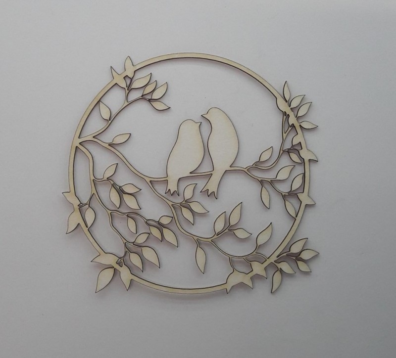 Лазерно изрязани птици и рамка